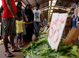 Sri Lanka's key inflation rate nearly halves to 6.3% in July from 12% June 2023