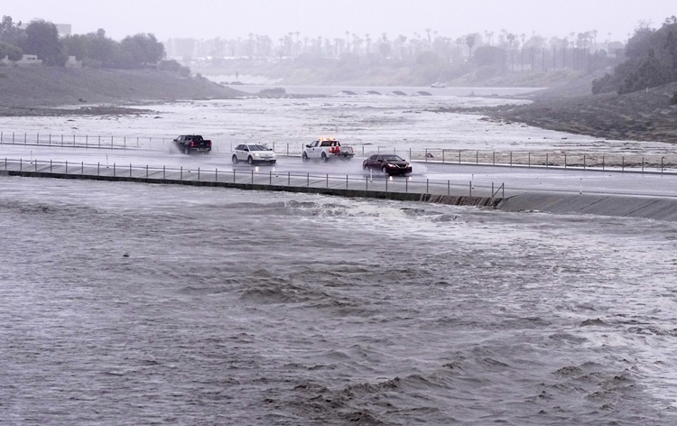 Tropical storm to hit Los Angeles in more than 80 years unleashed floods across parts of Southern California